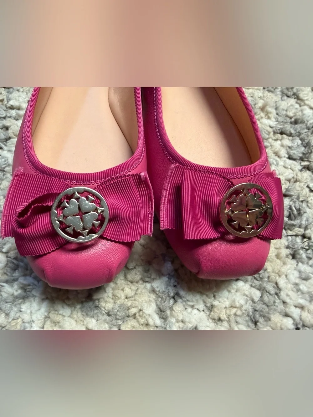 kate spade fuchsia bow ballet flats with logo medallion
